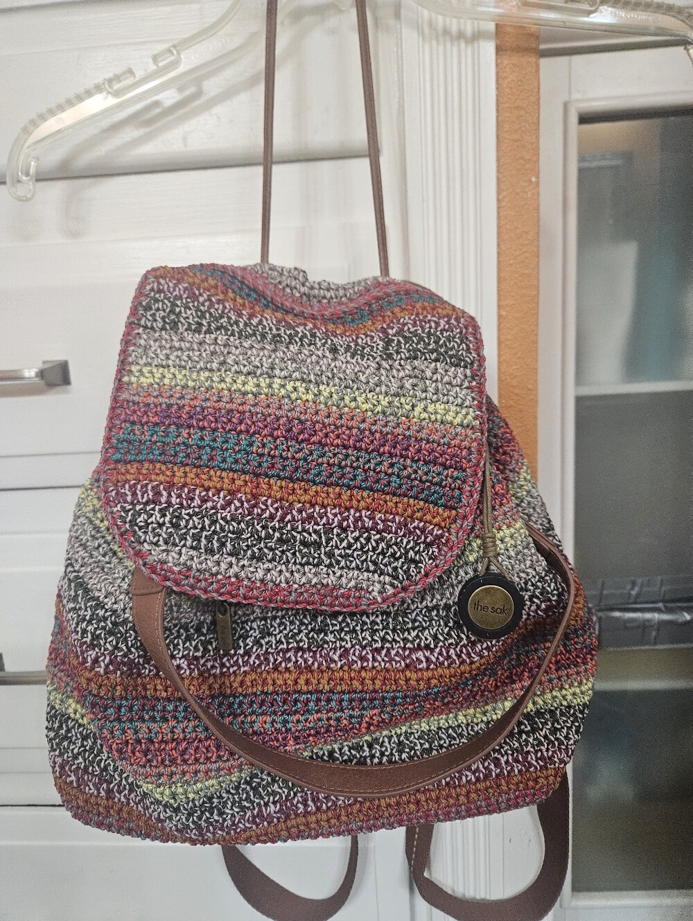The Sak Striped Crochet Multicolor Backpack with Brown Trim
